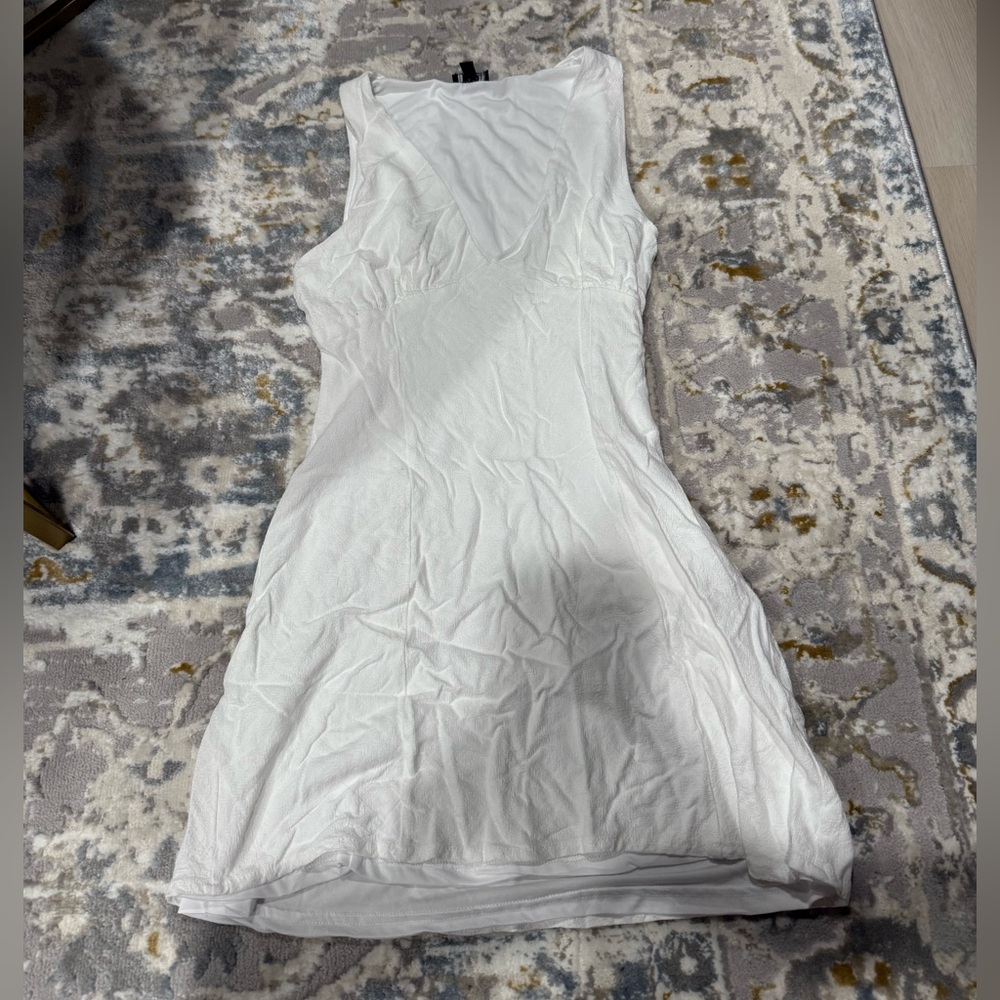 Sleeveless White Mini Dress with V-Neckline